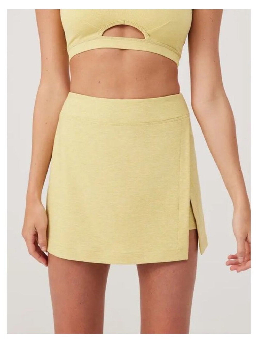 Outdoor Voices athletic skort in yellow heathered ginger